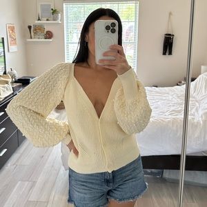 Off-white cardigan sweater with pearl beaded puff sleeves